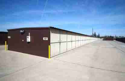 This image shows a row of storage units in an outdoor setting