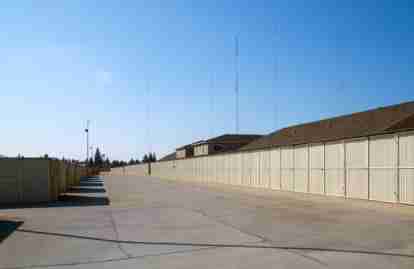 This picture shows a row of storage units in an outdoor setting