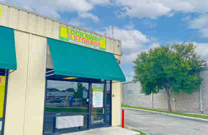 Lockaway Storage - Culebra Office with Lockaway Storage Signage and a blue cloudy sky