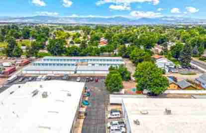 An aerial view of the property. Rows of exterior storage units are visible.