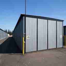 This image shows a row of outdoor storage units from end to end