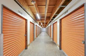 Interior Hallway of a A1 Storage Unit at Oceanside with Orange Storage Units