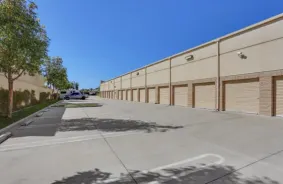 Larger Concrete Drive up storage units with security cameras