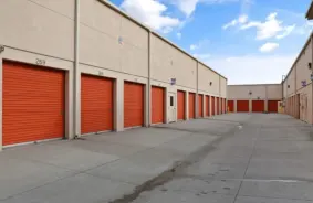 Open Driveway with orange storage units on both sides