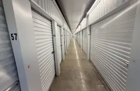 Hallway image of storage units at self storage property Storelocal Storage Co-Op, 28 Spur Rd, Sunrise Beach, MO, 65079