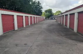 Spacious Driveway With Storage Units on Both sides