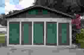 Hallway image of storage units at self storage property Extra Attic Self Storage, 634 Helvenston St. SE, Live Oak, FL, 32064