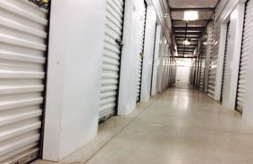 Hallway image of storage units at self storage property Storelocal Storage, 42738 4th Street East, Lancaster, CA, 93535