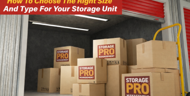 Image of moving boxes with StoragePRO logos being loaded into a storage unit with red door.