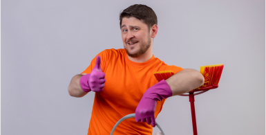 man thumbs up while cleaning