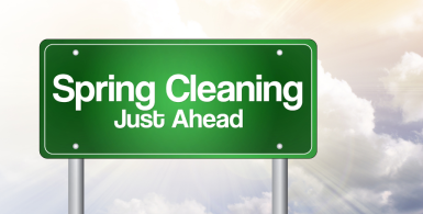 A billboard saying "Spring cleaning just ahead"