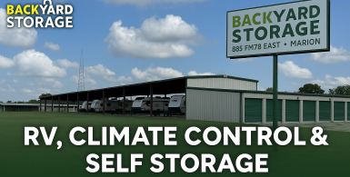 Wide exterior view of Backyard Storage in Marion, TX with a promotional one-line offer displayed over the facility background.