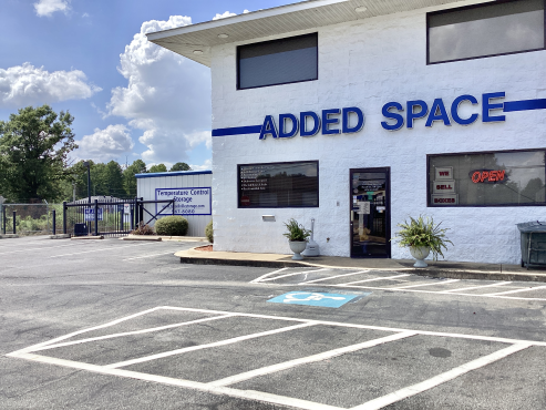Driveway of Added Space Storage on 1506 S Knoxville Ave, Russellville, AR, 72802