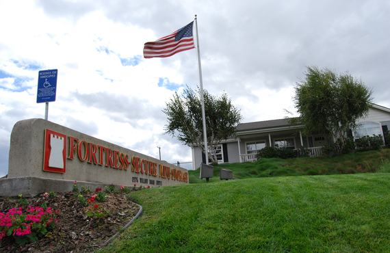 Flag and signage in front of Fortress Secure Mini Storage at 2175 Willow Road, Arroyo Grande, CA