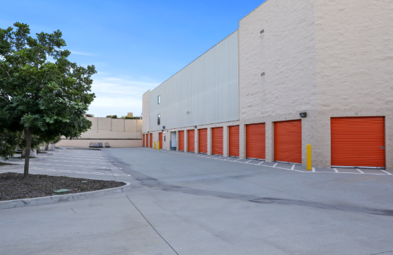 View of Outdoor Storage Units with orange roll up doors in Torrance