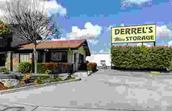 This 360 view shows the management office from the outside as well as a yellow sign reading Derrel's Mini Storage