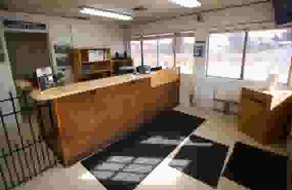 This image shows the front desk where our staff rent self storage units