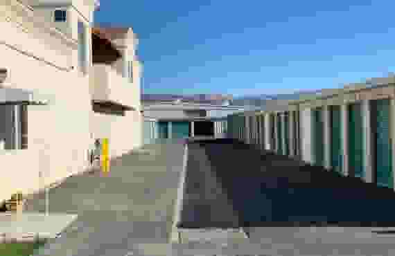 Office and row of storage units at All Safe Mini Storage - Morgan Hill at 16880 San Benancio Way, Morgan Hill, CA