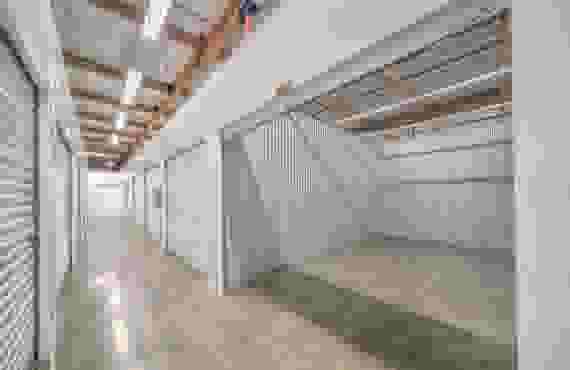 Image of Interior Hallway Storage Units with lights at StoragePRO Self Storage of Napa, CA
