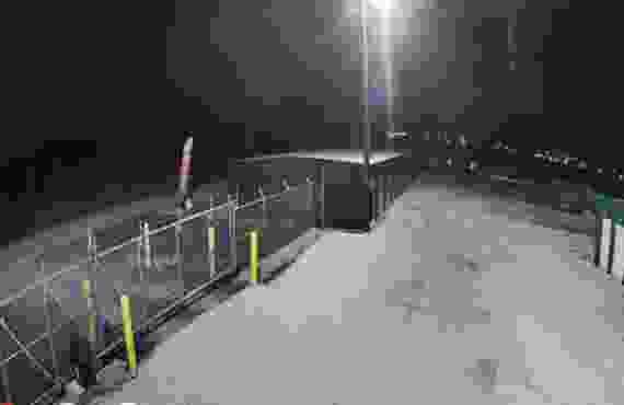 Security Camera Perspective of Front Gate of Storage Unit Facility