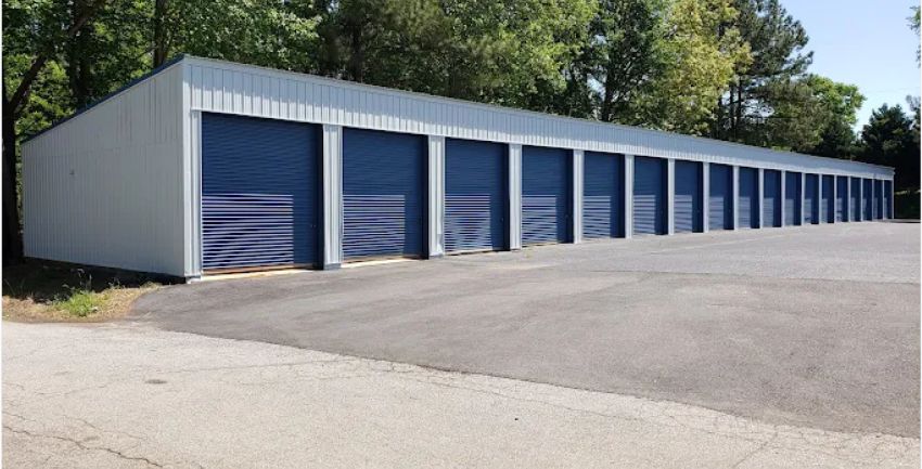 Anderson Mini Warehouse & Boat Storage blue roll up storage doors and easy drive up storage access