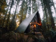 Autumnal Airbnbs for a lovely weekend trip brown wooden house in the woods