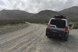 Stowaway cargo carrier on an SUV going off-road