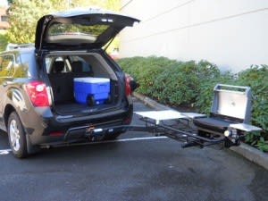 stowaway hitch grill station on a black SUV