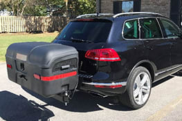Stowaway cargo carrier on black Volkswagen Touareg