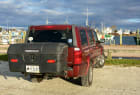 Red Jeep Commander with StowAway Max Cargo Box