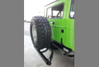 Green Jeep with StowAway Spare Tire Holder