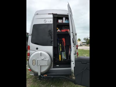 Sprinter Van with StowAway Max Cargo Box Swung Out with Door Clearance