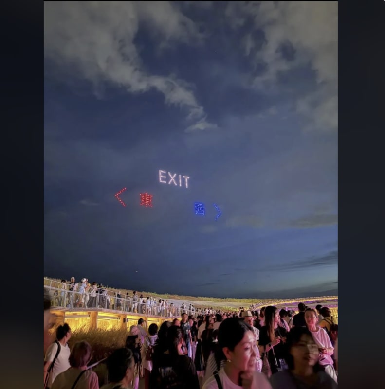 Drones being used to indicate exit for an event in Japan