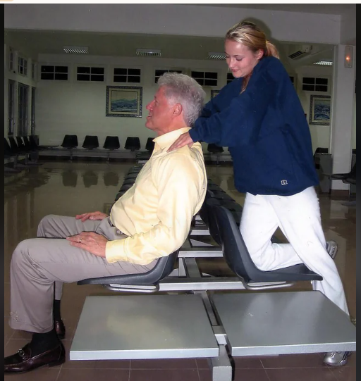 Bill Clinton getting a massage from Chauntae Davies Epstein victim in 2002