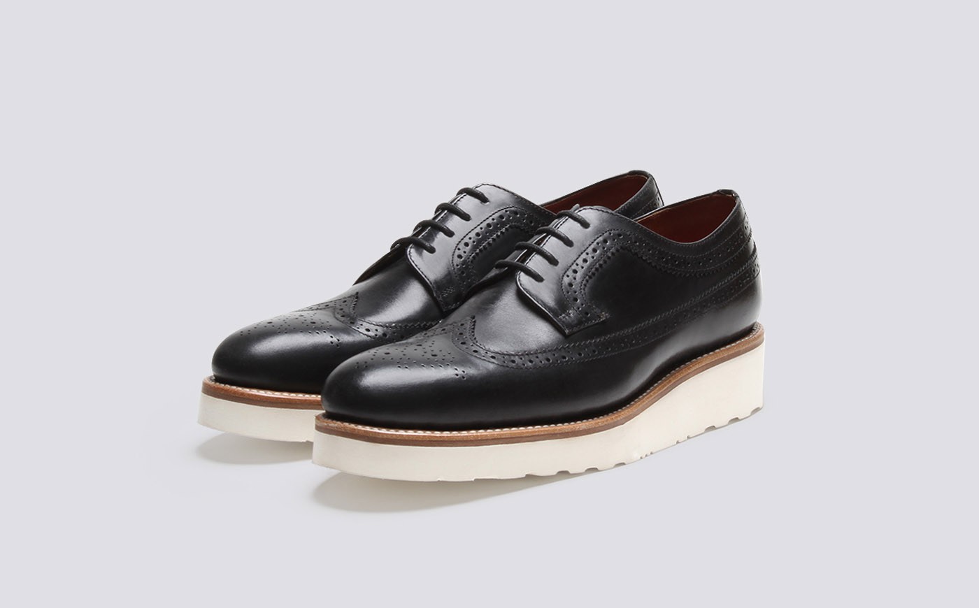 black brogues with white sole