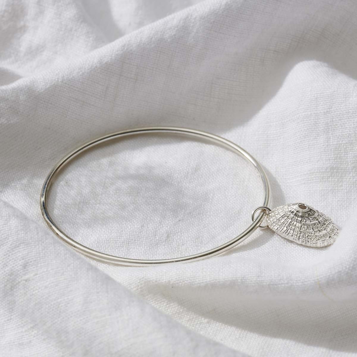 posh-totty-designs-silver-limpet-shell-charm-bangle