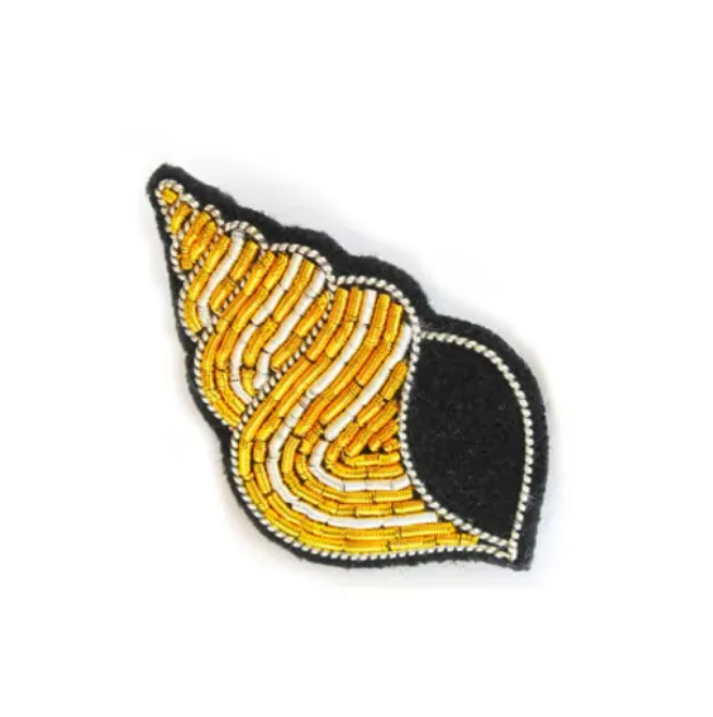 macon-and-lesquoy-yellow-and-black-whelk-brooch-1