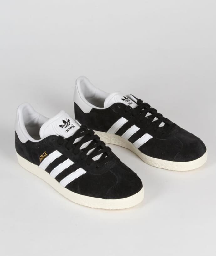 black and white leather gazelles