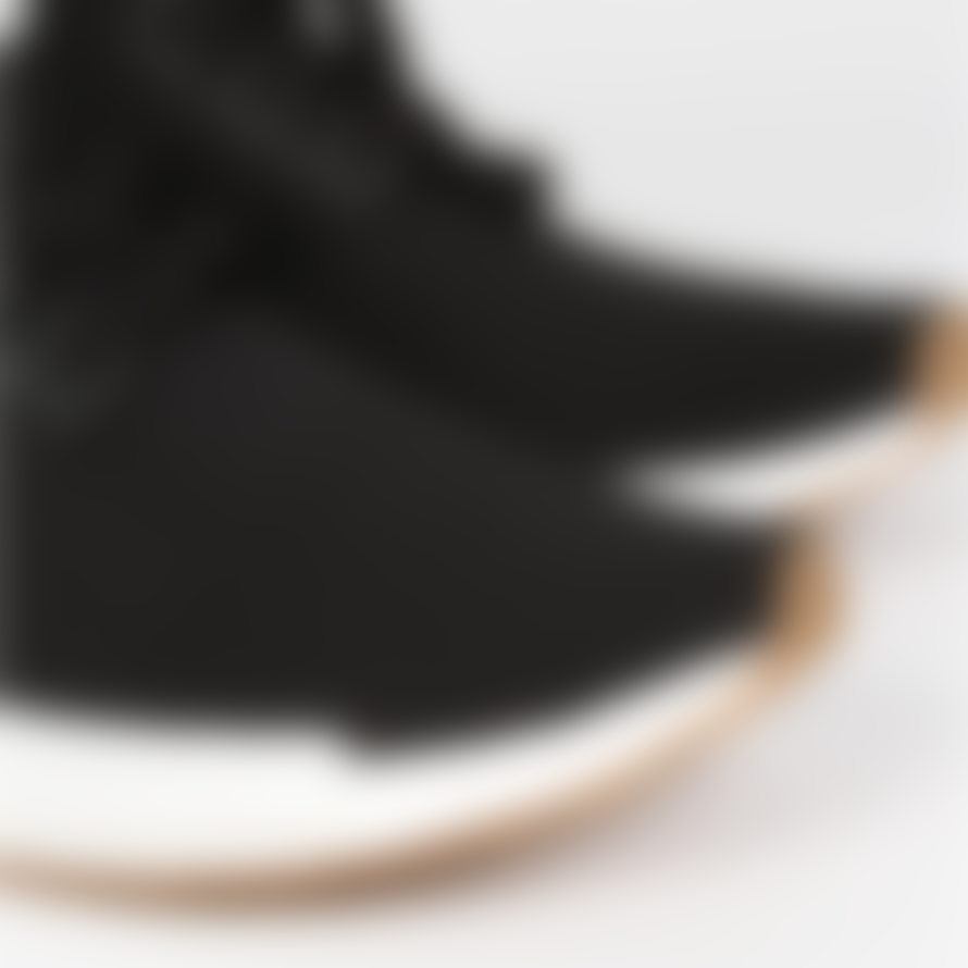 Adidas Originals Core Black Gum Nmd R1 Primeknit Shoes