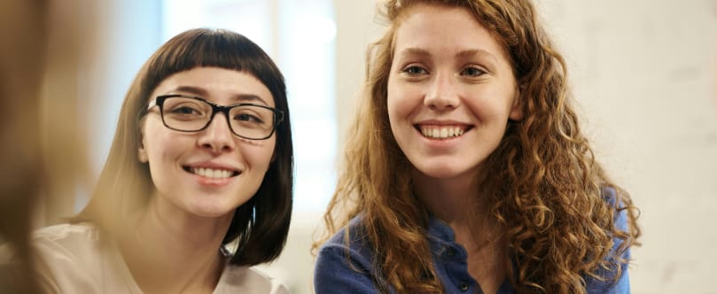 student.be assets/two_girls_working.