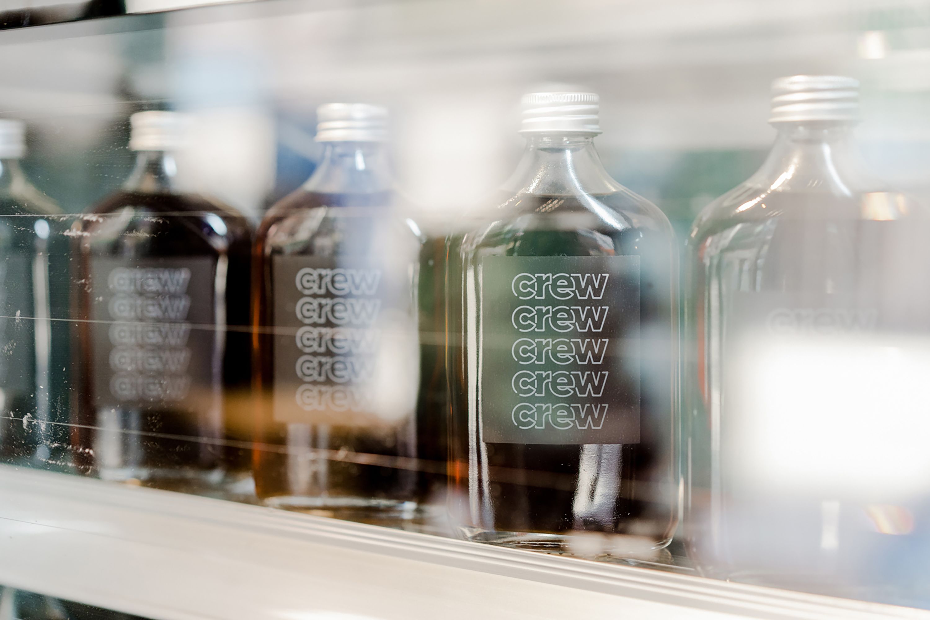 Crew branding print cold brew bottles