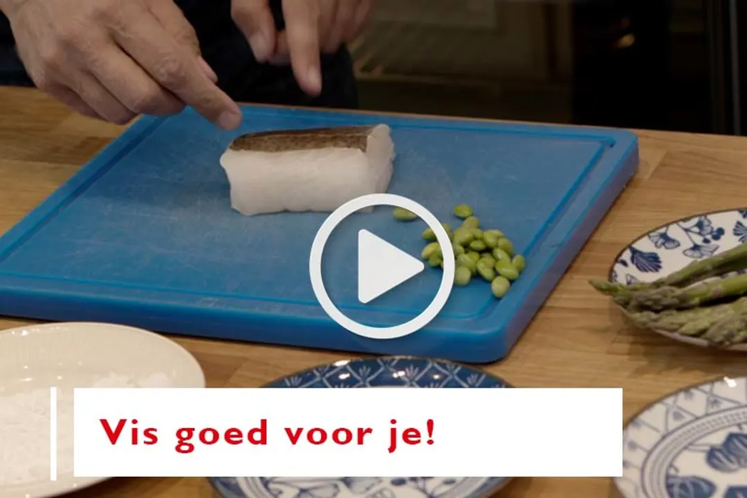 Kookvideo Vis op een snijplank en tekst Vis is goed voor je!