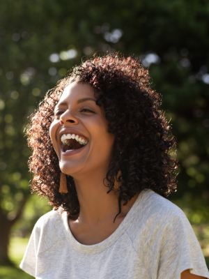 woman smiling in sunshine