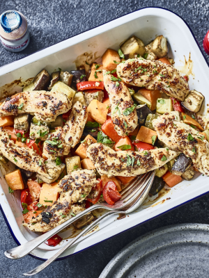 Chicken and vegetable tray bake with Yakult Light bottle