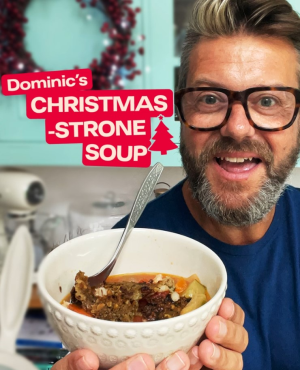 Chef holding plate of Christmas thigh roast