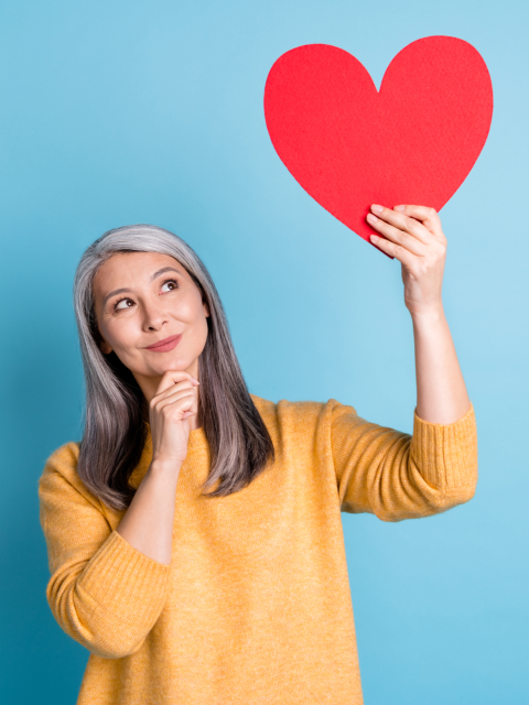 woman holding heart