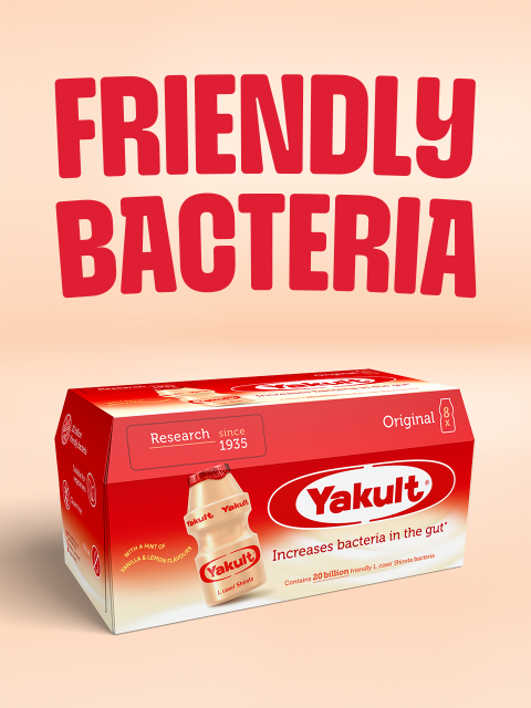 Yakult Original 8x65ml pack on a cream background with friendly bacteria written in red above