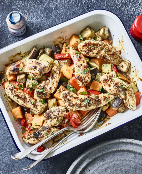 Chicken and vegetable tray bake with Yakult Light bottle