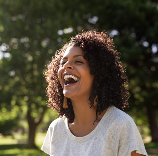 woman smiling in sunshine