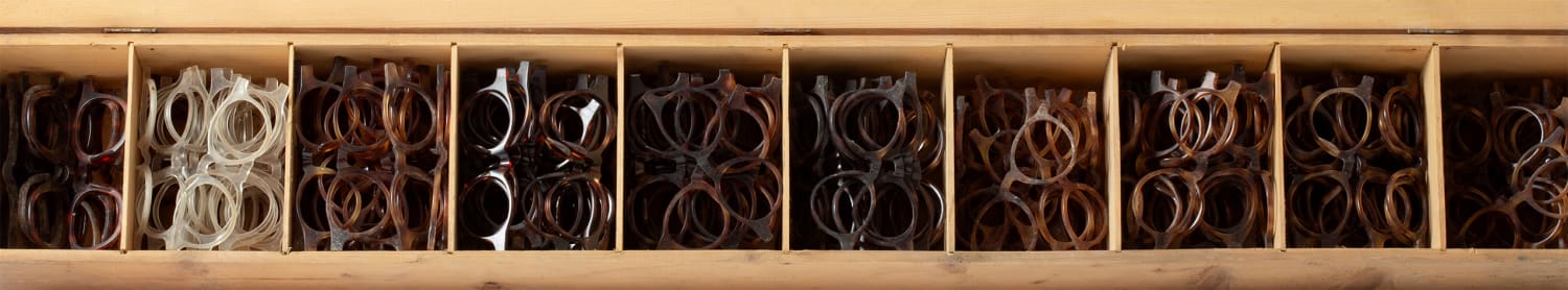 A view from a box of pantos fronts expected to have been made by Bourgeois (Morbier, Haut-Jura - FR) in the 1950 and 1960s. It’s the original wooden container from the factory with approximately 240 fronts of 4 to 8mm acetate in it, raw and untouched for 60-70+ years.